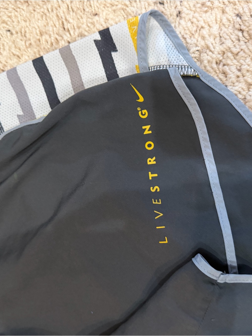 Nike Livestrong Black Athletic Shorts with Gray Trim and Yellow Logo - Picture 2 of 3